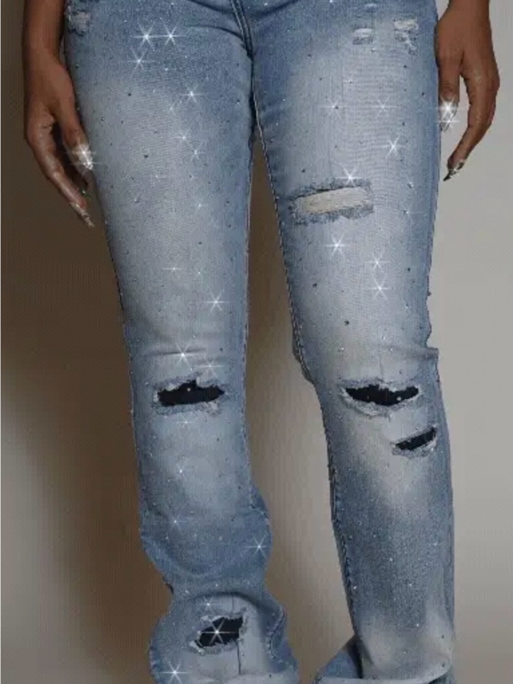 Women’s Light Blue Boot Cut Jeans with Distressed Detail
